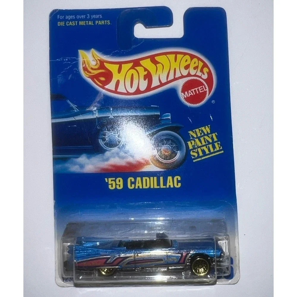 (b31/3)1991 Vintage Hot Wheels Blue/White Card #266 '59 CADILLAC‎ Blue w/Gold